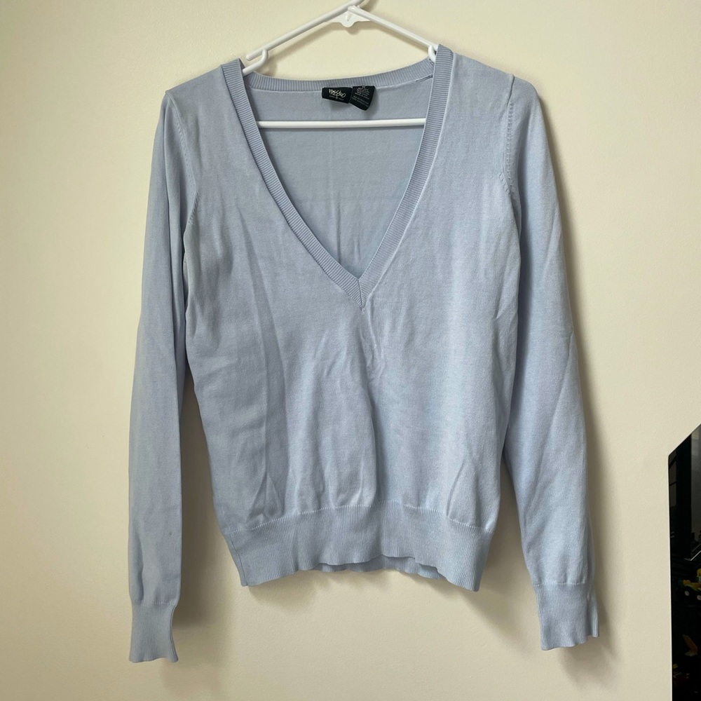 Light blue sweater